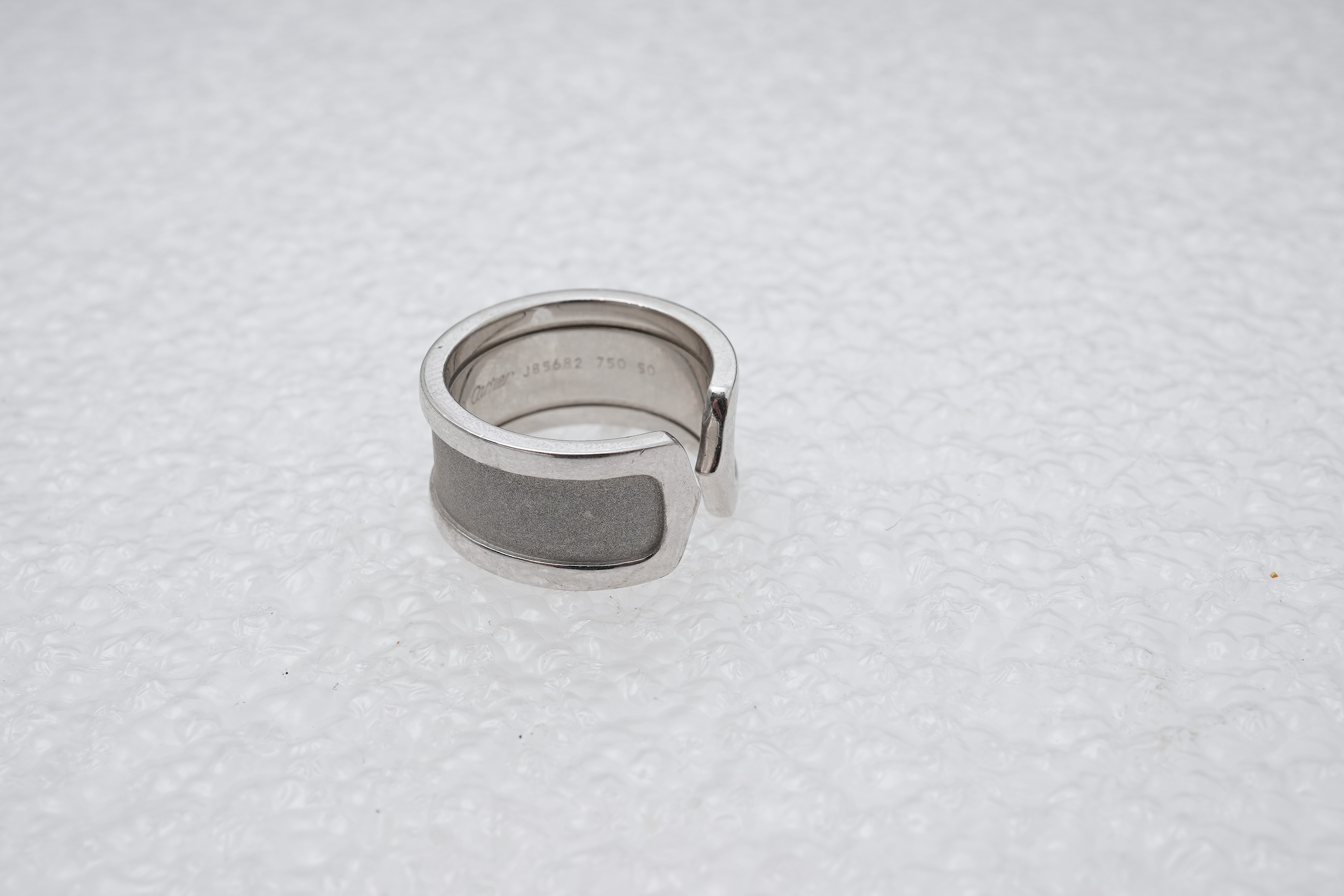 Cartier, a white gold ring, 'C de Cartier', circa 2000